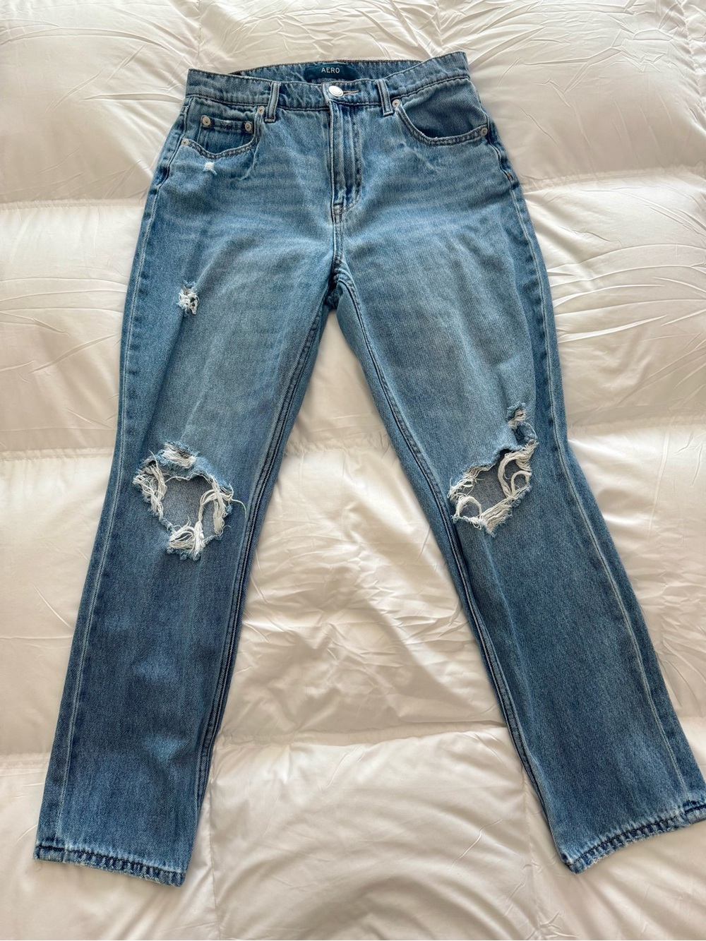High-Rise Distressed Jeans